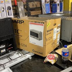 Sharp 1.5 cu. ft. Over the Counter Microwave in Stainless Steel with Sensor Cooking Technology