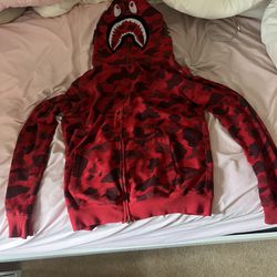 RED BAPE HOODIE SLIGHTLY WORN, DOWN FOR TRADES