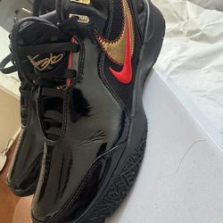 LeBron NXXT Gen AMPD Black University Red Gold
