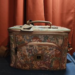 Vintage carry on makeup luggage.