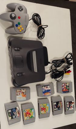 Nintendo 64,with  8 Games cartridge s