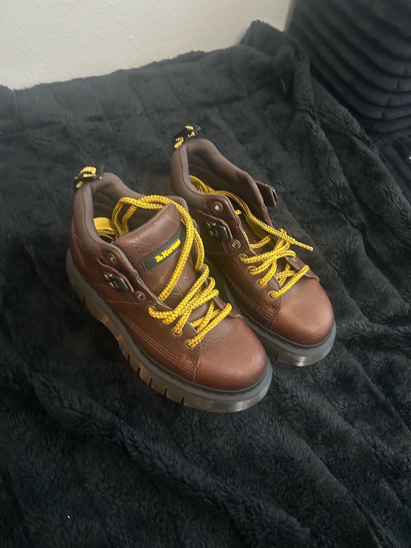 Dr. Martens Woodard Grizzly Leather Hiker Boots in dark brown featuring yellow laces