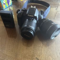 Canon T5i camera w kit lens + canon efs wide lens 10-18mm + battery charger
