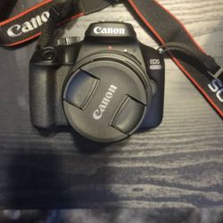 Canon eos d4000 18mp dslr with accessories 