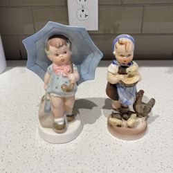 Hummel statues-2 counts- spring themed