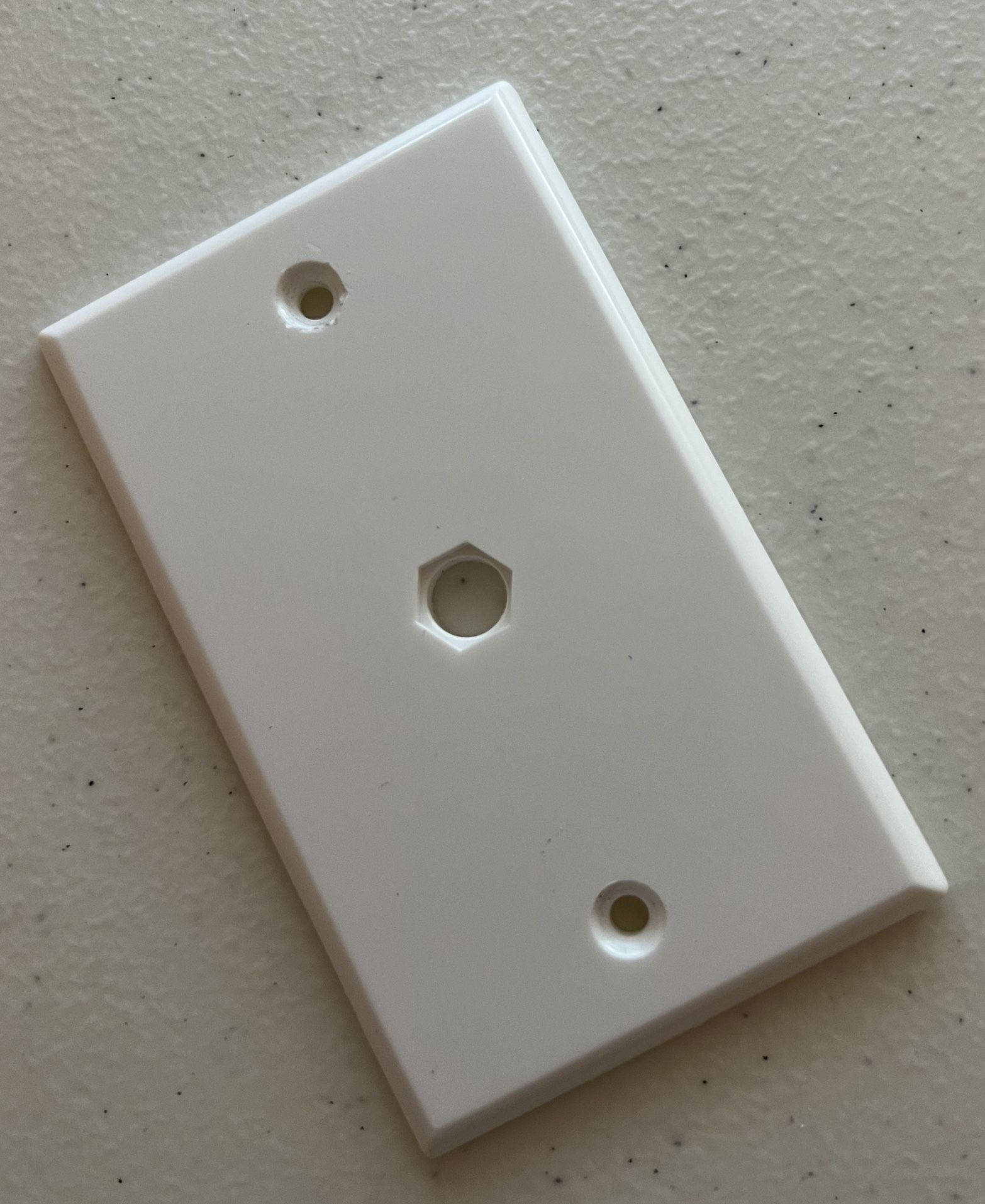 PLASTIC OUTLET COVER FOR COAX CABLE
