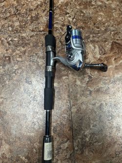 Practically New Rod and Reel Set Up by Daiwa . Used once
