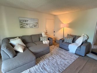Ashley’s furniture couch/ottoman/love seat set
