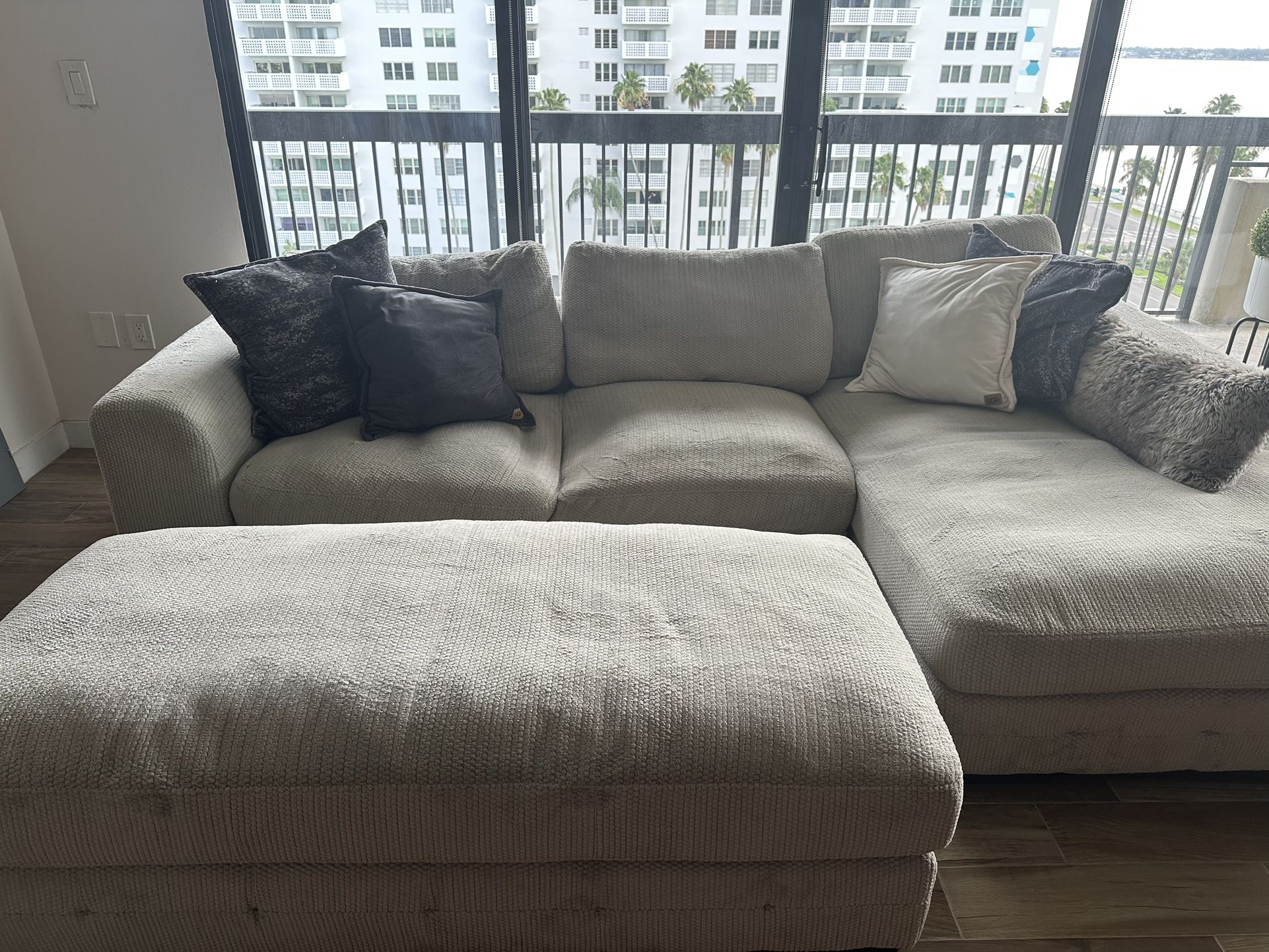 American Signature grey couch and ottoman