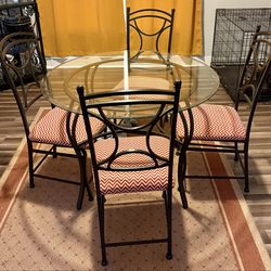 Glass table and 4 chairs