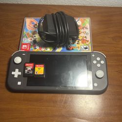 Gray Nintendo Switch Lite+charger And Games!!