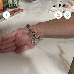 Michael Kors silver tone bracelet. 