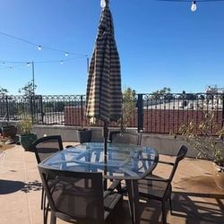 Brown Jordan patio/outdoor dining set with umbrella