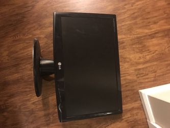 Two matching LG computer monitors.