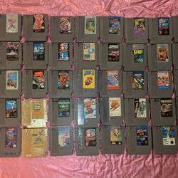 Huge Vintage Nintendo NES Lot - 58 Cartridges, 2 Consoles, Zappers, Game Genie