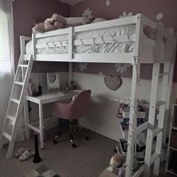 Twin size bunk bed with desk attached