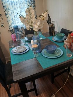 Table for sale and 3 chairs pick up only