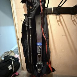 Ski, pole, gear bag bundle. 