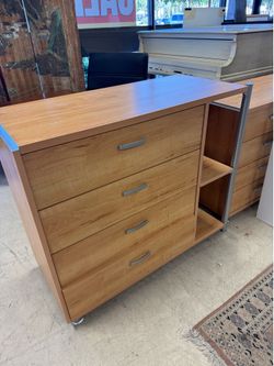 drawer chest features two open shelves and slender metal handles - 40” x 18” x 34”