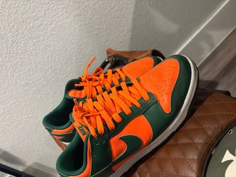 Nike Dunk Low Miami University sneakers in orange and green