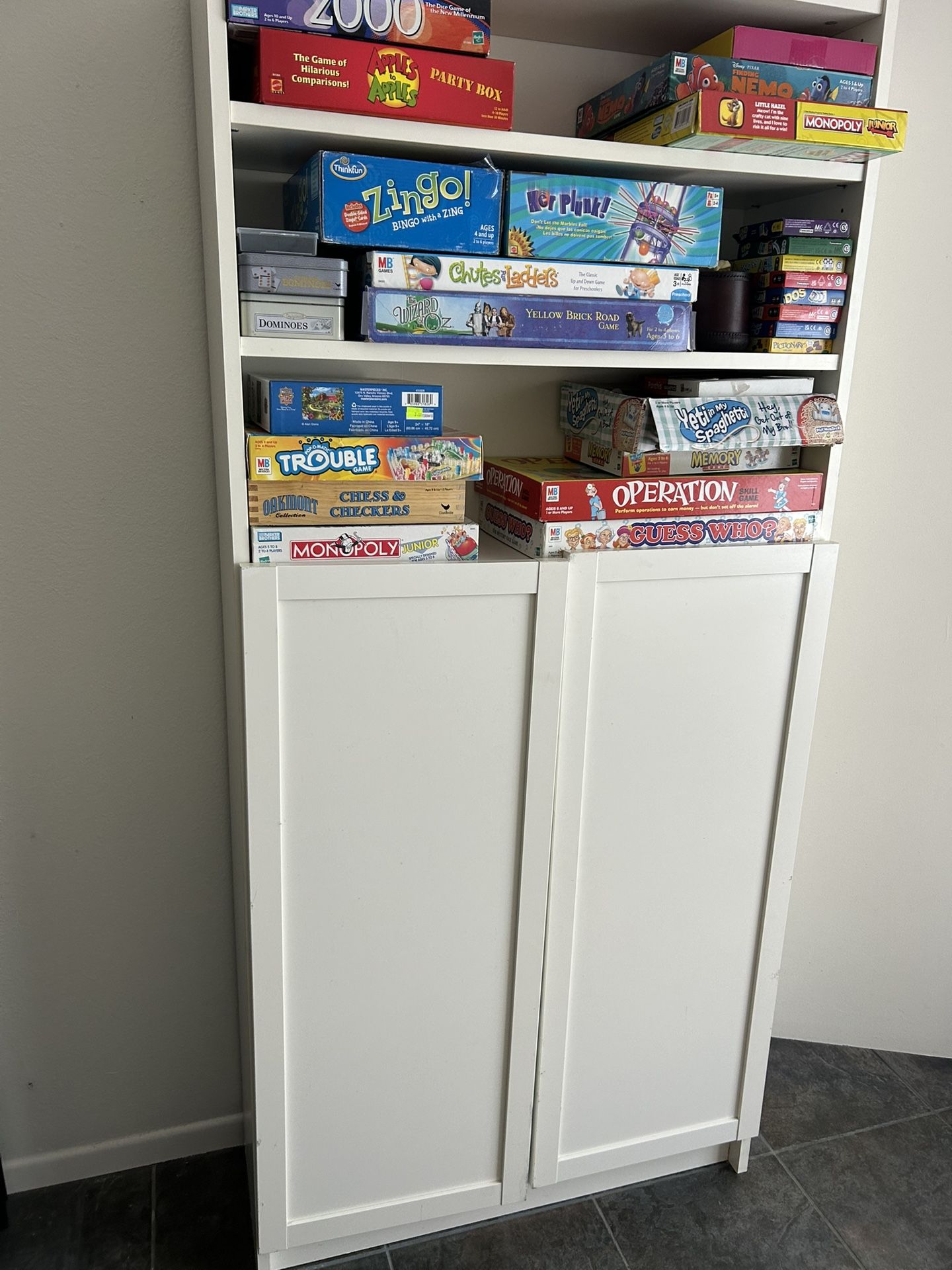 White IKEA Billy bookcase with doors