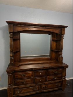 Two piece solid wood dresser with mirror.