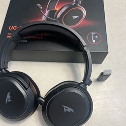Wireless gaming headphones, Unused and comes with extra wire with a built in microphone. 