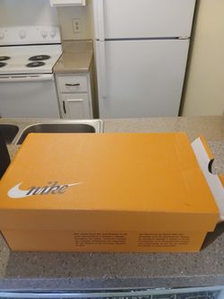 Nike Blazer Mid '77 Vintage sneakers in white with a black swoosh.