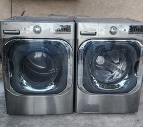 L G WASHER AND ELECTRIC DRYER 