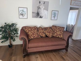 Traditional Carved Wood Sofa with Accent Pillows