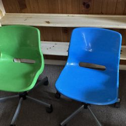 2 Kids Plastic Desk Chairs