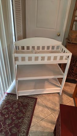 White wooden baby changing table