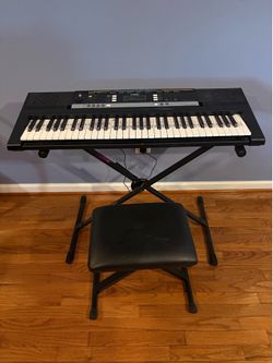 Electronic keyboard w/stand, stool and power cord. Like new. Works perfectly.