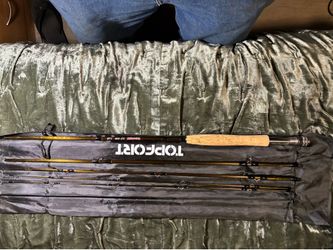 TOPFORT 4-piece fly fishing rod. And box of flys