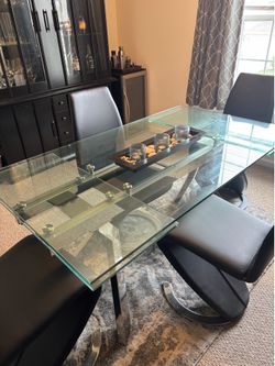 Glass dining room table with 4 chairs