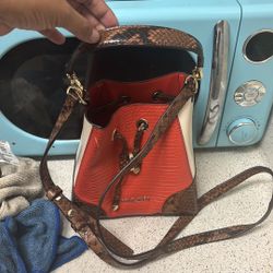 Michael Kors Stylish orange and Brown Bucket Bag