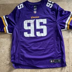 Signed  Minnesota Jersey By ( Shariff Floyd ) 