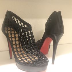 Christian Louboutins "red bottoms" size 41