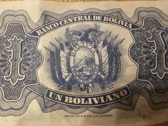 UN BOLIVIANO EN ORO O GIROS-ORO