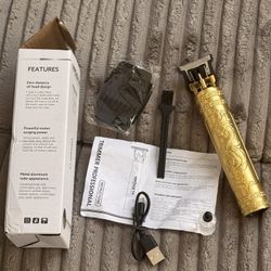 CORDLESS RECHARGEABLE GOLD PLATED HAIR TRIMMER WITH ALL ACCESSORIES NO BATTERIES EVER NEEDED MAKES A GREAT GIFT