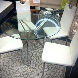 White 5pcs Round Dinette Set 4 Chairs  Material: Clear Glass Top with Chrome Dining Table Faux Leather with Chrome Dining Chair   Dim