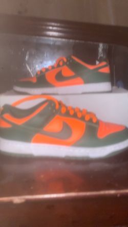 Green and orange Nike dunks