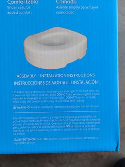 Raised toilet seat