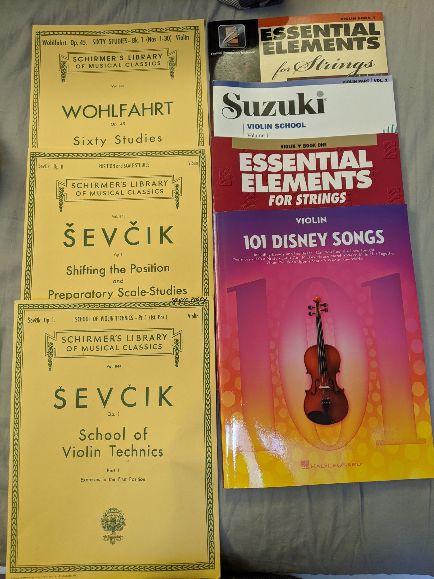 Seven Violin books/sheet music