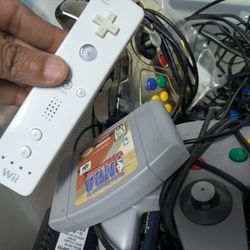 Nintendo 64 2 controllers 1 game 1 Nintendo Wii controller not working as is
$10 everything  from the pictures 
Nothing working 