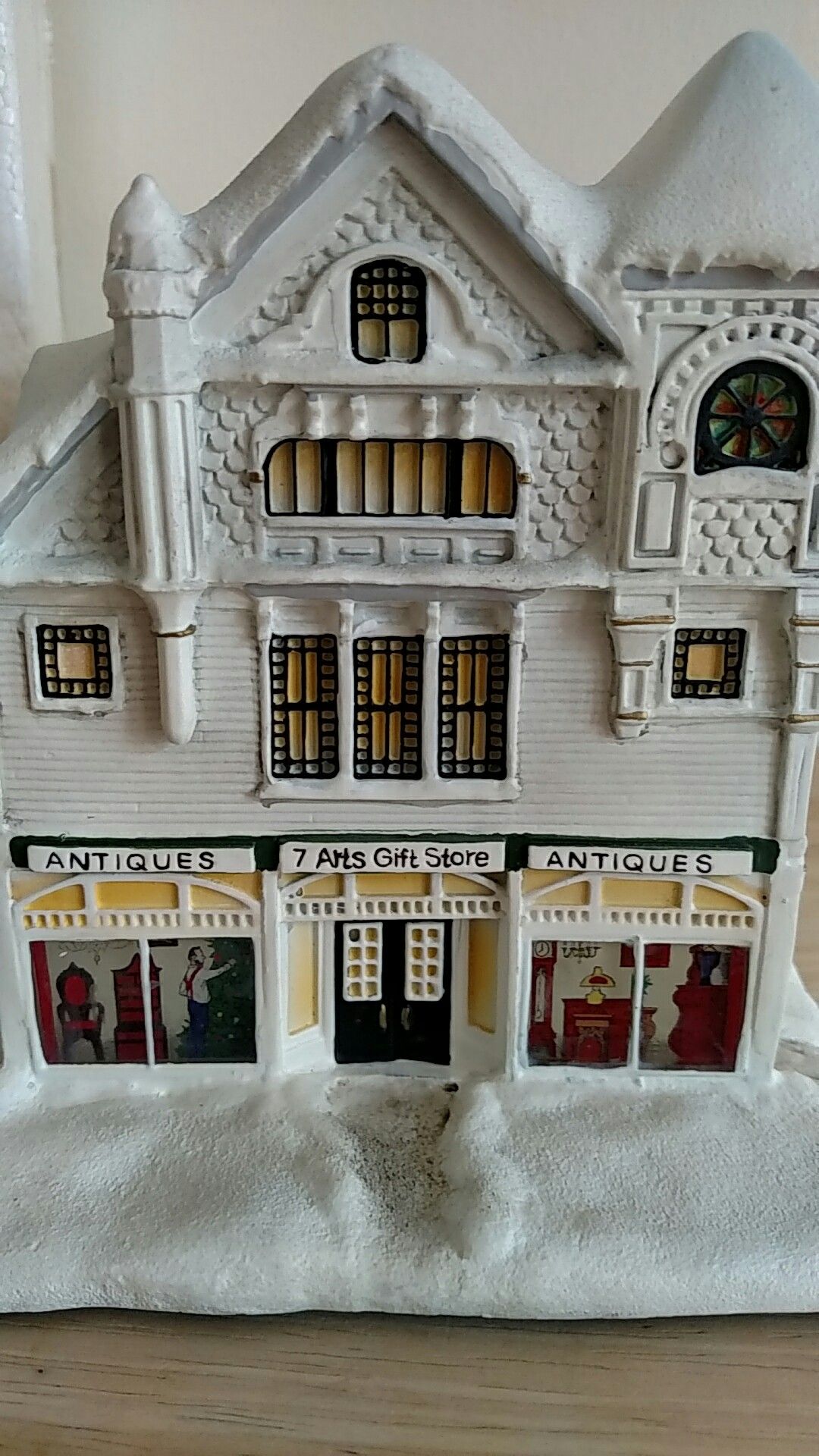 Norman Rockwell's Christmas village Antique store