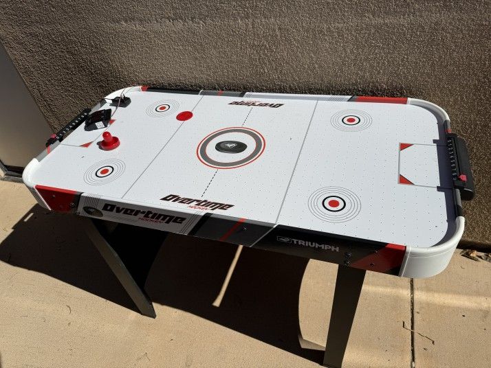Triumph Overtime Air Hockey Table with Laser based digital score keeper.