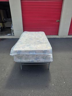 Brand new twin size mattress and box spring in plastic