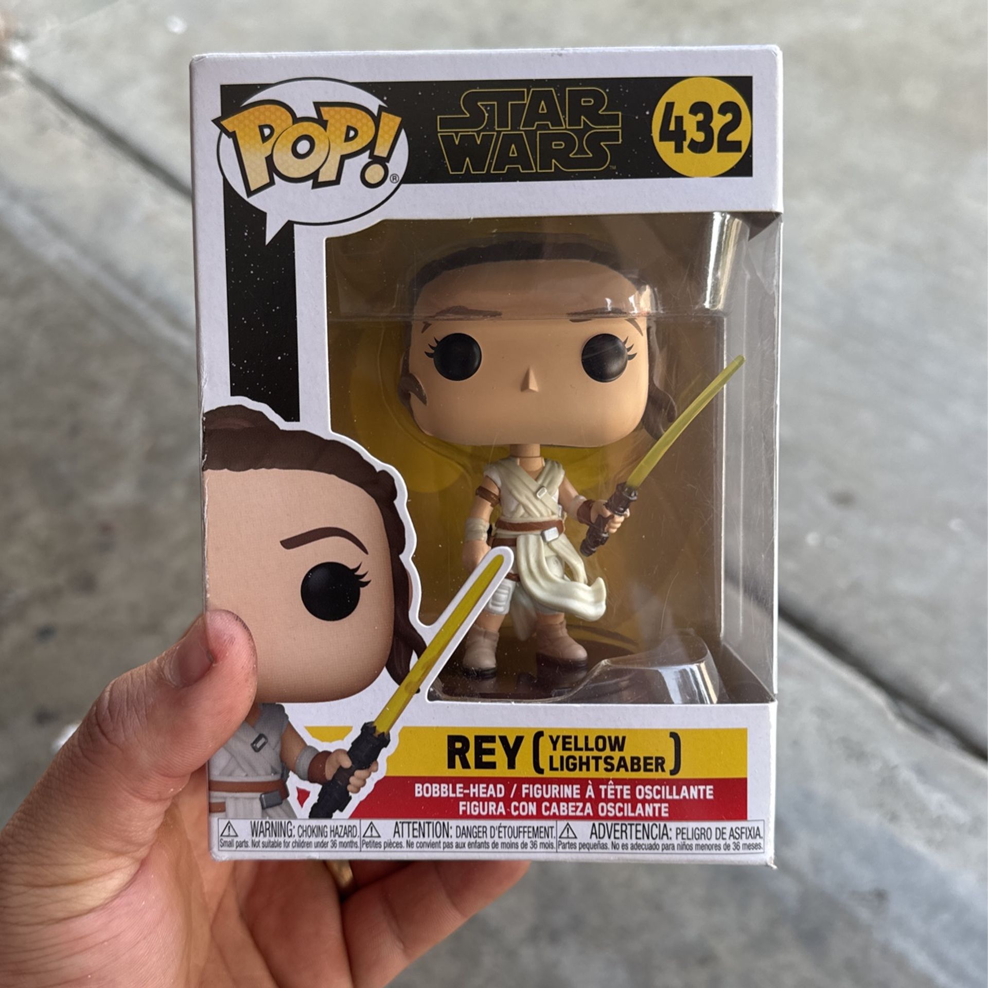Star Wars Rey Yellow Lightsaber Funko