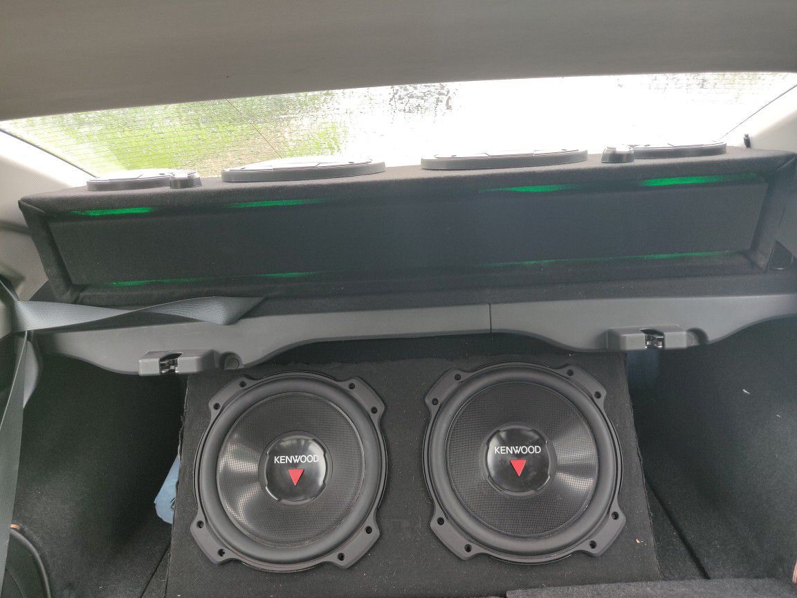 BOSS 1100W Amp And (2) 12" Kenwood Subs